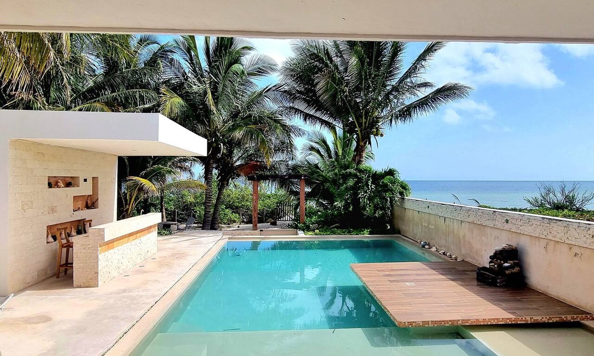 Telchac Puerto House | Beachfront House: Pool, kayaks, and a large terrace. Perfect for families. Pet-Friendly.