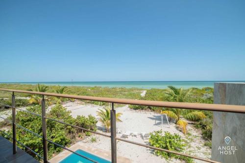Merida House | Beachfront Villas with Private Pool Steps to the Sea!