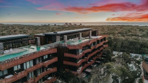 Playa Paraiso Apartment | Bright 2BR Amira District Gem with Shared Pool