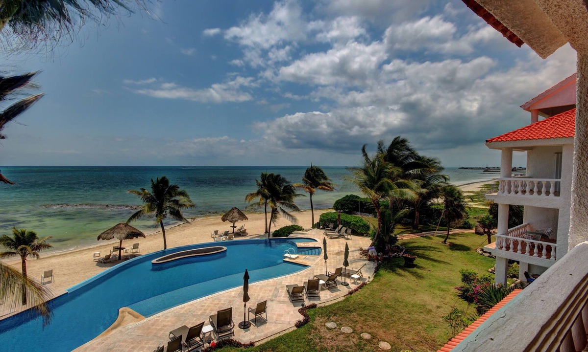 Puerto Morelos Apartment | Condo #232 at Caribbean Reef Villas - OceanFront, huge pool for families/couples