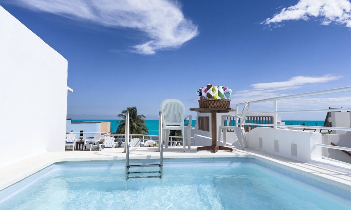 Puerto Morelos House | Five-bedroom ocean view home with private rooftop pool, elevator, and WIFI