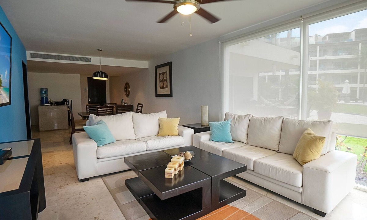 Puerto Juarez Condo | Ground Floor Unit with Views of the gardens and pool at The Elements by BRIC