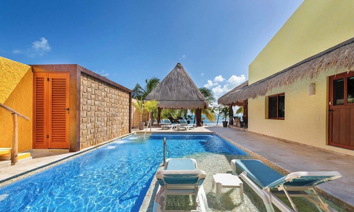 Isla Mujeres Villa | Oceanfront Villa w/Private Beach, Dock, Heated Pool & Sunset Views in Sac Bajo