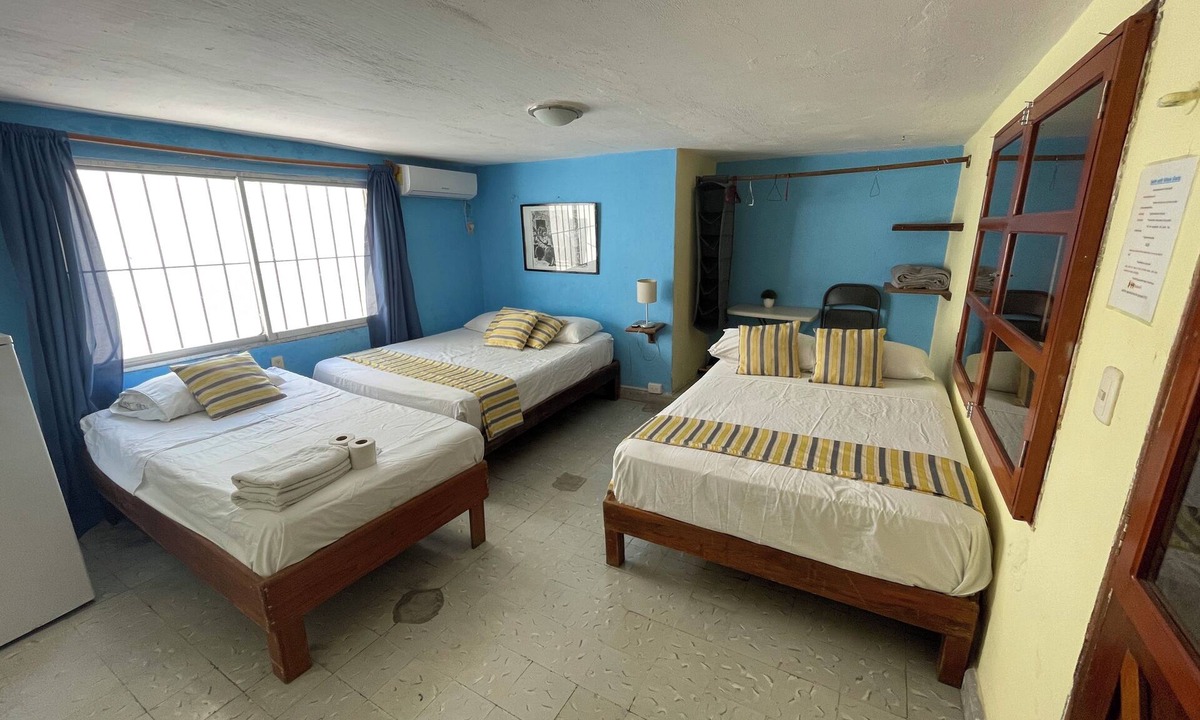 Centro - Supmza 001 Apartment | Private room for 5 people. A/C, TV, Wi-Fi, minibar, kitchen and living. Downtown | Isla Mujeres #1