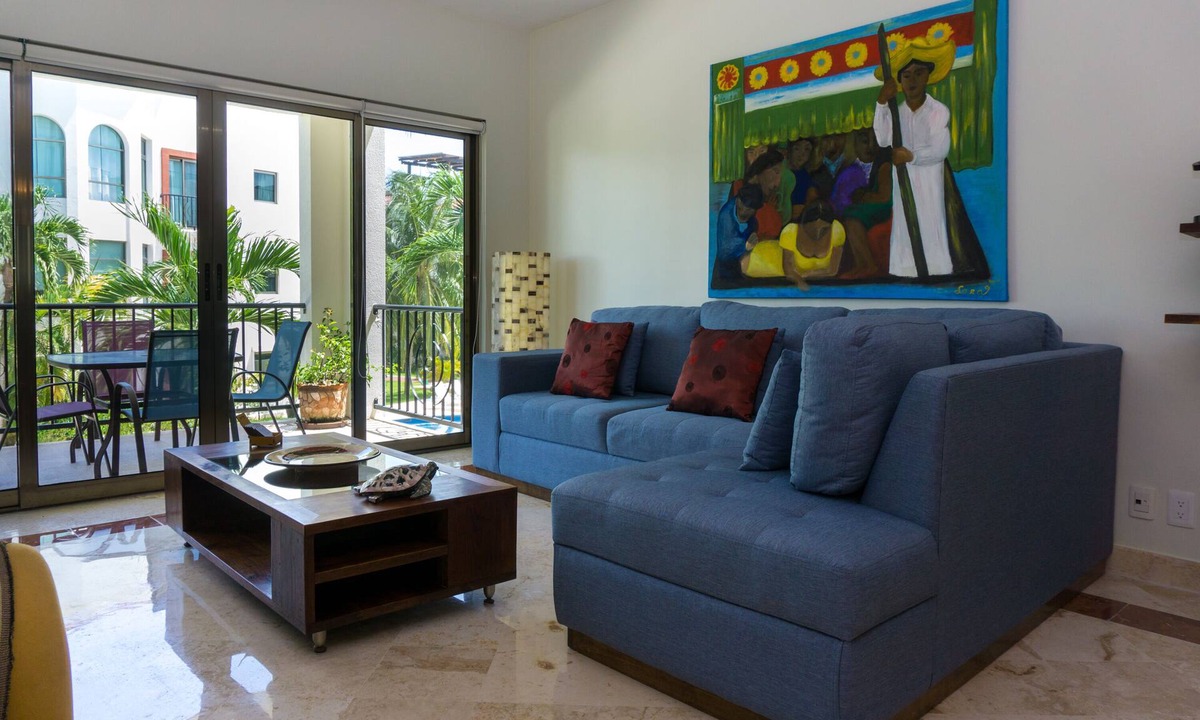 Playacar Fase I Condo | Second Floor Unit with views of the gardens and pool at Paseo del Sol by BRIC