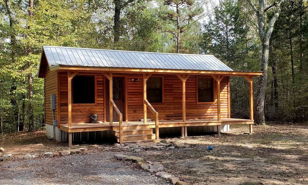 Pickens Cabin | Stunning Riverfront Log Cabin Nestled Amidst Trees in Nashoba, Oklahoma
