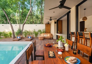 1-Bed Condo Kitchen Island Pool Views