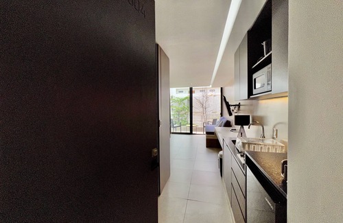 Playacar Fase I Apartment | Beautiful Studio with Roof Top Pool and Ocean Views