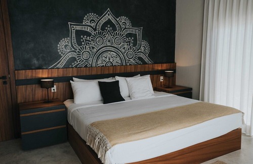 La Veleta Apartment | Casai | Secluded stay with a private garden inside eco-chic community