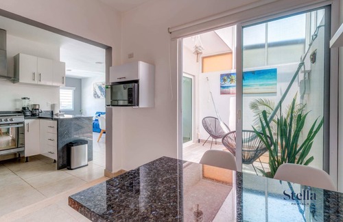 Puerto Juarez Apartment | Comfortable Family Retreat: Pool, BBQ & Playground