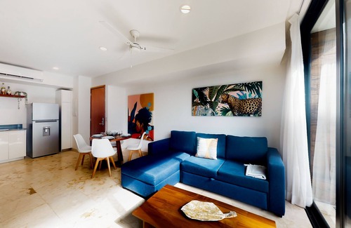 Zazil-ha Apartment | Dog-friendly luxe apartment in a great location with a pool, gym, & balcony