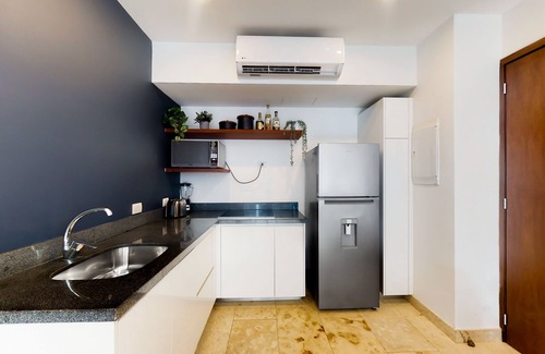 Zazil-ha Apartment | Dog-friendly luxe apartment in a great location with a pool, gym, & balcony