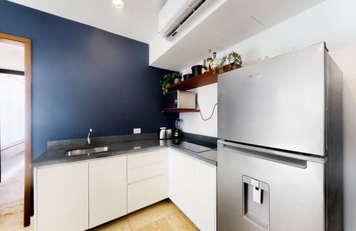 Zazil-ha Apartment | Dog-friendly luxe apartment in a great location with a pool, gym, & balcony