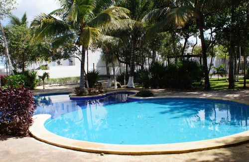 Puerto Juarez House | La Casa del Mexicano terraza y jardin exoticos 12 min del playa Esmeralda