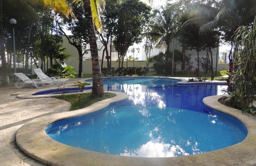 Puerto Juarez House | La Casa del Mexicano terraza y jardin exoticos 12 min del playa Esmeralda