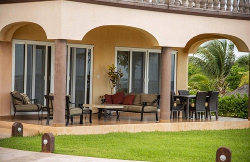 Puerto Morelos Condo | Luxury three bedroom villa facing the Caribbean Sea with a large terrace