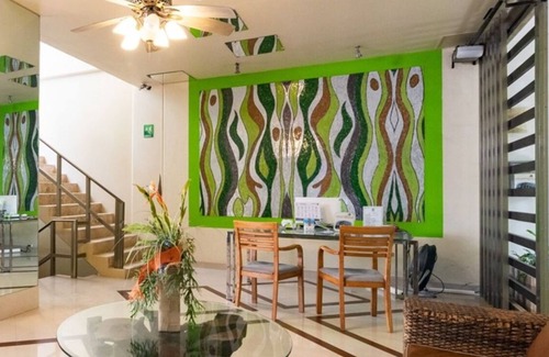 Gonzalo Guerrero Condo | Modern condo with patio and balcony overlooking 5th Ave. 4 minute walk to beach!