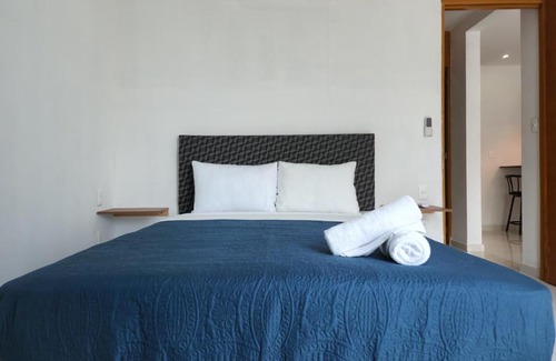 Luis Donaldo Colosio Apartment | Ocean and city view rooftop, apartment 2BR 101