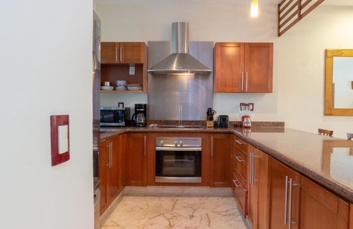 Playacar Apartment | Paseo del Sol Coral B 107 condo