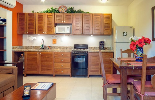 Puerto Morelos Apartment | Private patio overlooking the pool. 2-minute stroll to the beach.