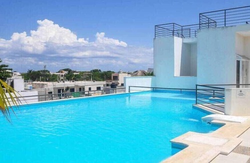 Centro Apartment | Rooftop Pool | Balcony | 3 blocks to 5th Avenue