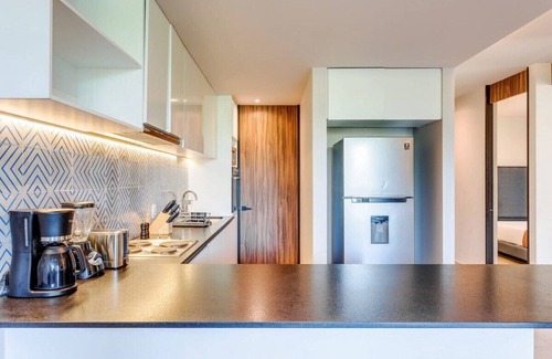 Ejidal Apartment | Rooftop Pool | Private Balcony | Gym | Fast WiFi