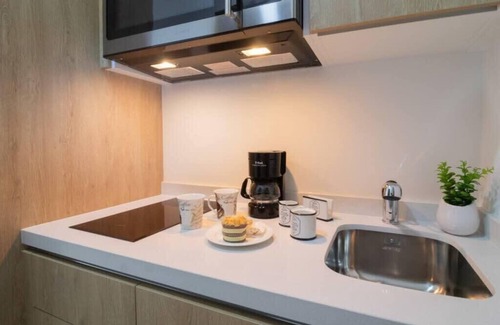 Gonzalo Guerrero Apartment | Studio Near 5th Ave, Infinity Roof Pool, Mini Gym!