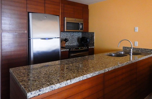 Isla Mujeres Condo | Unwind in luxury – penthouse overlooking Garrafon Reef Park