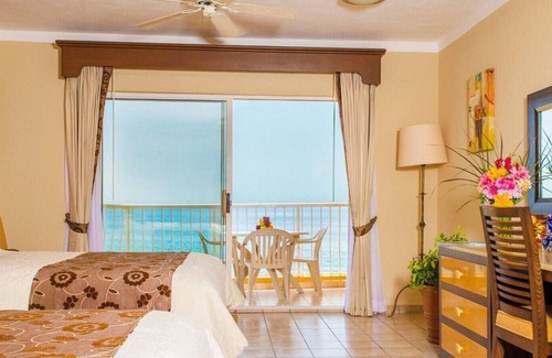 Playa Mujeres House | Villa Del palmar Cancun Luxury beach resort . 1 Suite 2 queen size beds.