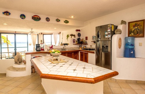 Akumal Condo | Walk onto the beach from your patio door! AC, WiFi, great for families!