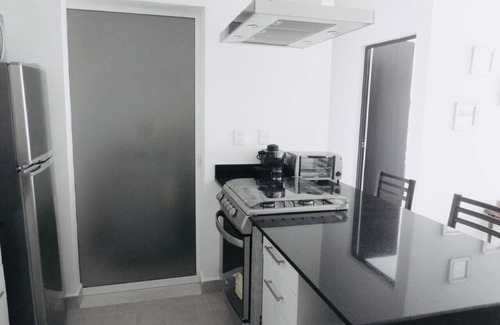 Puerto Juarez Apartment | Well equipped apartment minutes from the beach