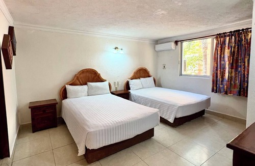Downtown Cancun Hotel | 2 Units | Central Cancún Hotel | Walk to Plaza Las Americas & Culture Center