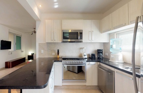 Playa del Carmen Apartment | Air-conditioned condo with strong WiFi, pool, river pool & tropical gardens