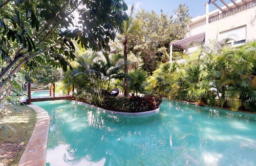 Playa del Carmen Apartment | Air-conditioned condo with strong WiFi, pool, river pool & tropical gardens
