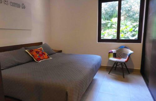 Akumal Apartment | Aku-Chic Newly furbished condo Jungle pool