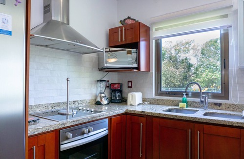 Playacar Condo | Amazing corner 2 bedroom condo in Paseo del Sol by BRIC