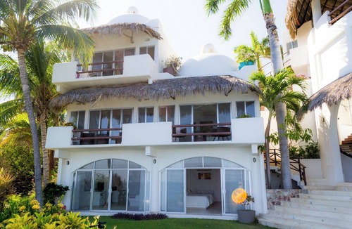Santa Maria Huatulco House | An exclusive beach house, perched on a cliff with panoramic ocean views.