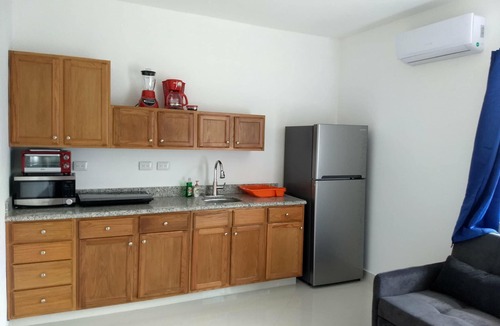 Colonia Centro Condo | Awesome Carribean Views and a Brand New Condo half block from the water!