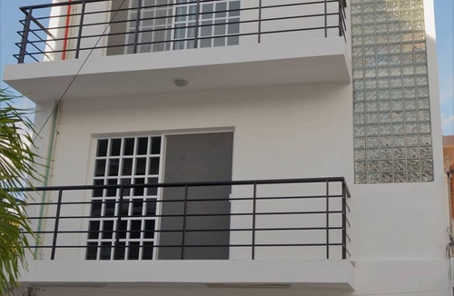 Colonia Centro Condo | Awesome Carribean Views and a Brand New Condo half block from the water!
