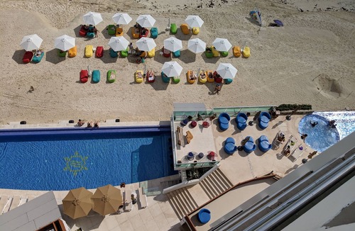 Punta Cancun Condo | Beachfront resort in best location, walk to best clubs and restaurants