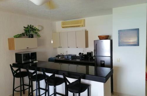 Puerto Juarez Apartment | Beautiful condo a few steps to sea