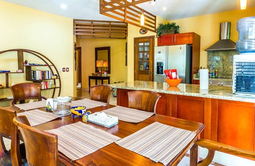 Playacar Condo | Beautiful Garden floor condo with pool views in Paseo del Sol by BRIC