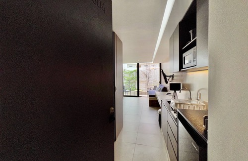 Playacar Fase I Apartment | Beautiful Studio with Roof Top Pool and Ocean Views