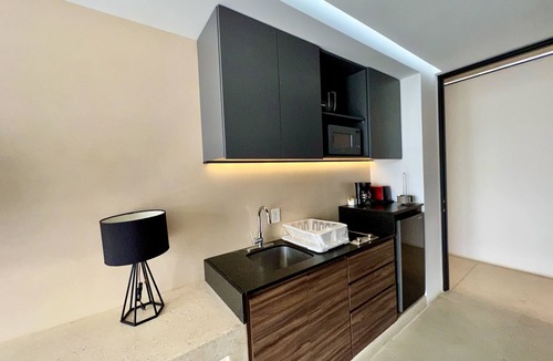 Playacar Fase I Apartment | Beautiful Studio with Roof Top Pool and Ocean Views