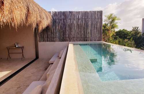 Zama Apartment | Boho Chic 2BR condo by Happy Address