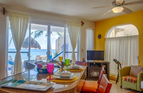 Akumal Condo | Bright and Affordable condo! Right on the beach with a pool!
