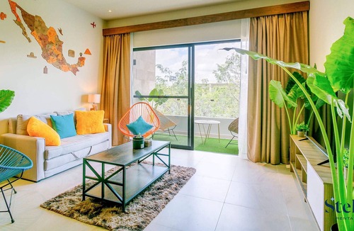 Puerto Juarez Condo | Bright & Cheerful Condo + Pool, Gym & Playground!