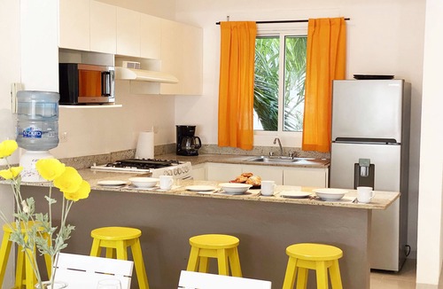 Zazil-ha Condo | Central 2BR, 1 Block to Beach, Large Private Roof, Pool, Parking, Rooftop Pool