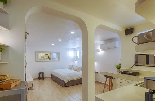 Akumal Condo | Charming garden view studio with beach access, WiFi and AC.