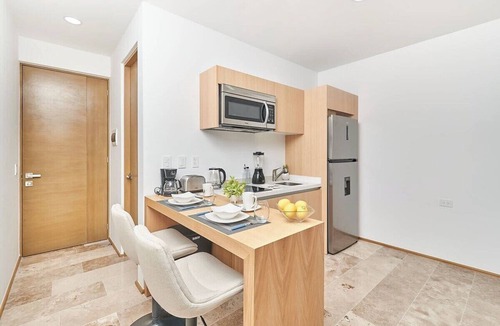 Centro Apartment | Coastal escape w/rooftop pool, gym & beach walk